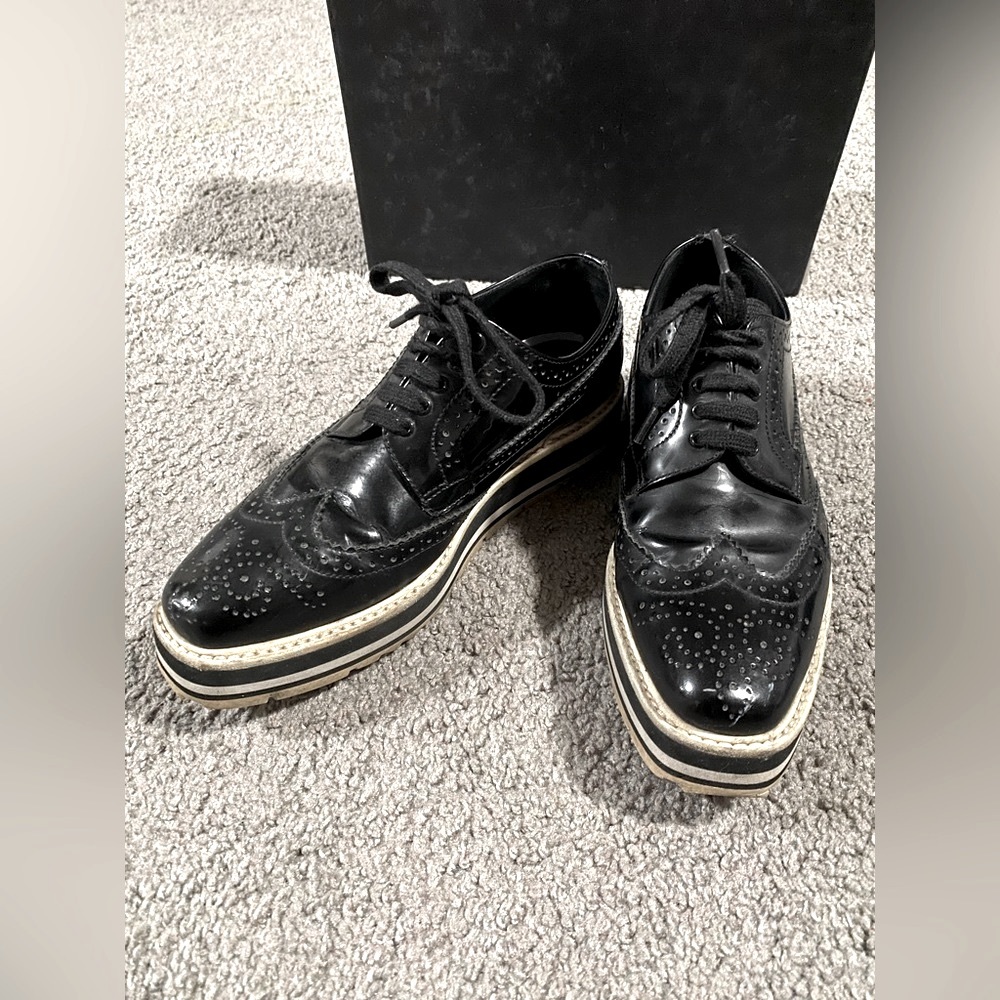 Prada Woman Black Wingtip Leather Platform Brogues Sneakers